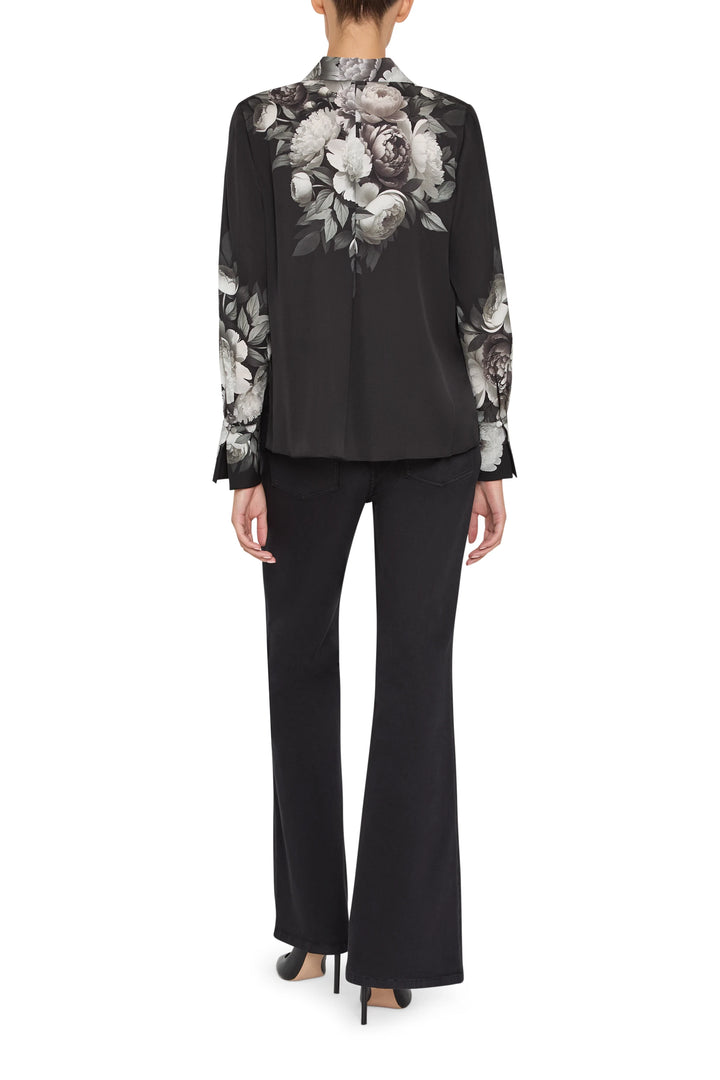 Printed silk blouse with relaxed silhouette, long sleeves, and back yoke seam; back view on model.