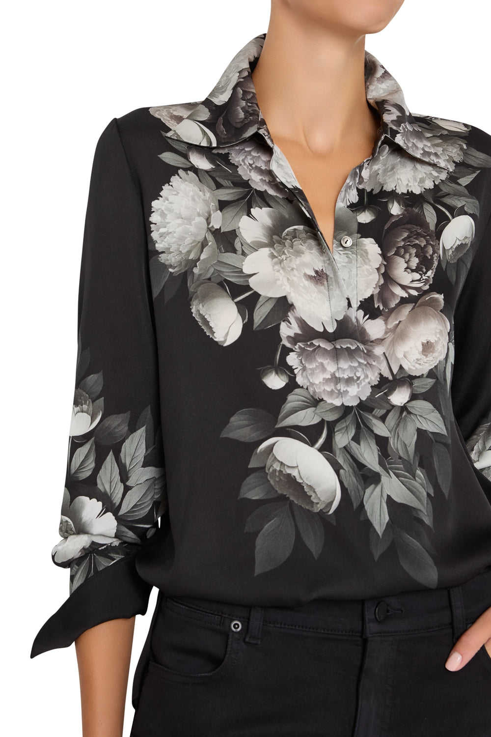 Silk blouse with botanical print, relaxed fit, rolled sleeves, button front, fluid silhouette; front view on model.