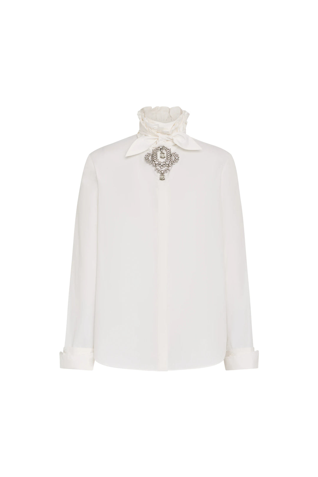 Poplin shirt with ruffled neck, jeweled brooch, structured silhouette, button placket. Front view on white.