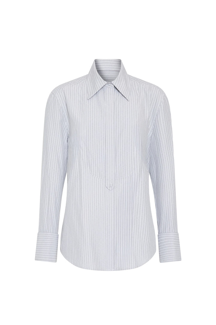 Oversized button-down with long sleeves, wide cuffs, vertical light blue/white stripes. Front view on white.