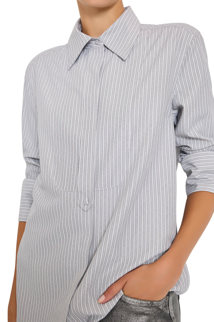 Relaxed fit Tanner Striped Shirt with rolled sleeves and button front, classic collar; front view on model.