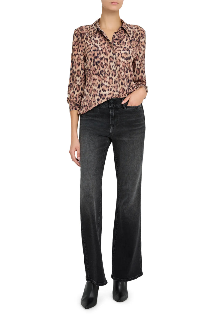 Relaxed-fit blouse with v-neckline, gathered yoke, long sleeves, button cuffs. Front view on model.