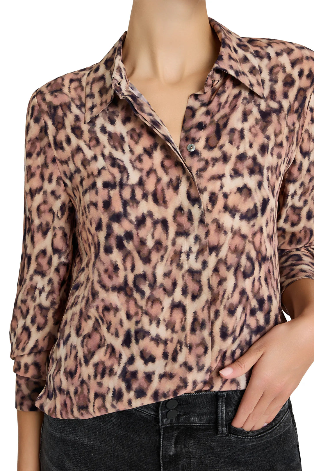 Relaxed-fit blouse with bishop sleeves, pintucked bodice, and soft drape. Front view on model.
