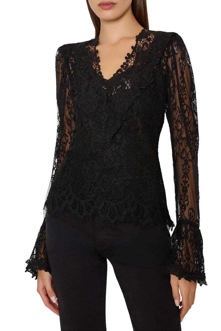 Callie Lace Blouse in black Chantilly lace with V-neck, long embroidered puff sleeves, and scalloped trim. Front view.