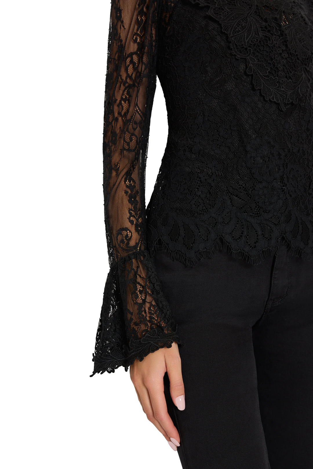 Callie Lace Blouse in black Chantilly lace with high neckline and long embroidered puff sleeves, side view on model.
