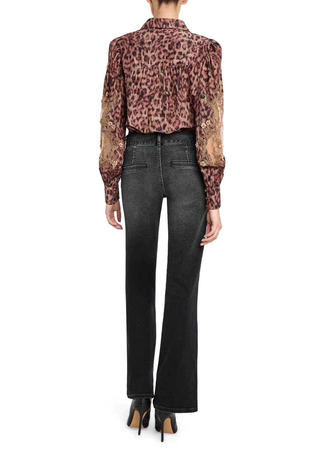 Relaxed-fit blouse with artisan sleeves and allover print, button front closure. Back view on model.