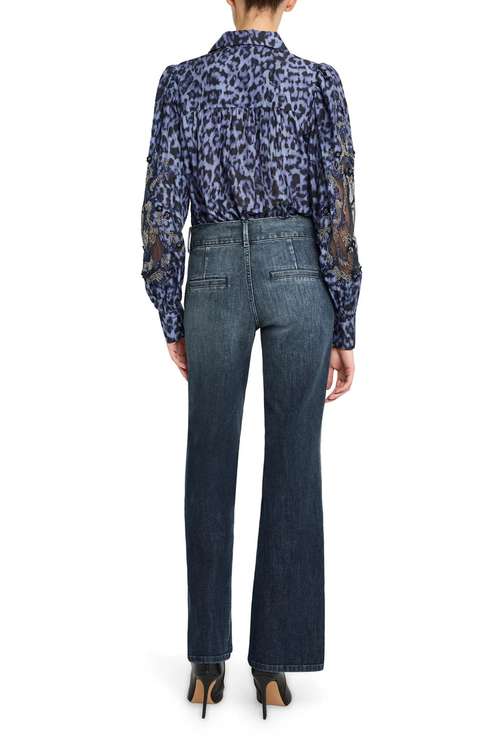 Long-sleeve printed blouse with artisan sleeves, relaxed silhouette, lightweight fabric; back view on model.