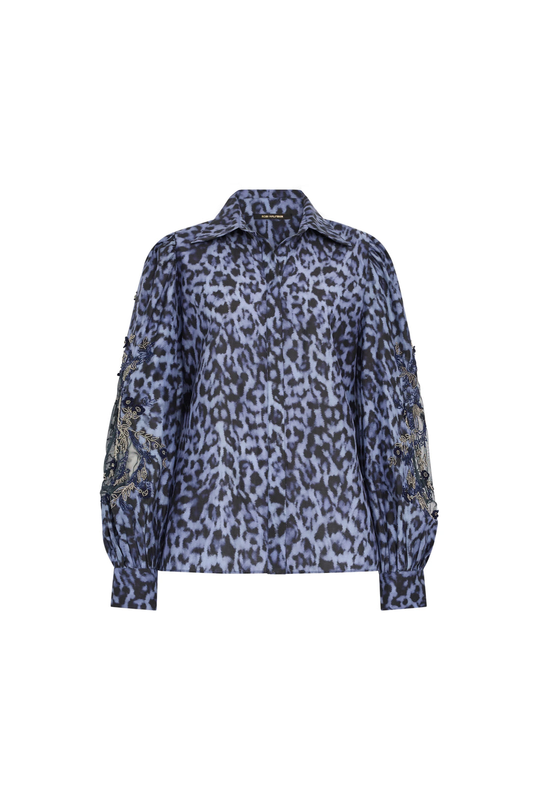 Silk-cotton voile blouse with blue-black leopard print, artisan sleeves, and embroidery; front view on white.