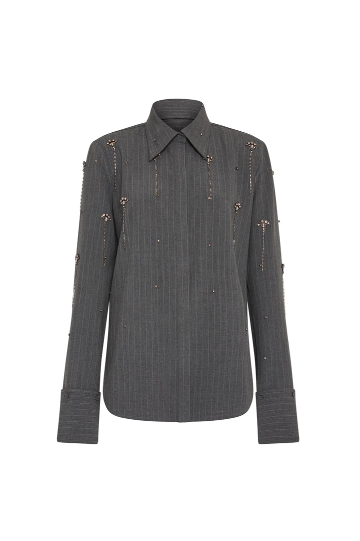 Relaxed-fit shirt in dark gray pinstripe with crystal embellishment, structured collar, wide cuffs; front view on white.