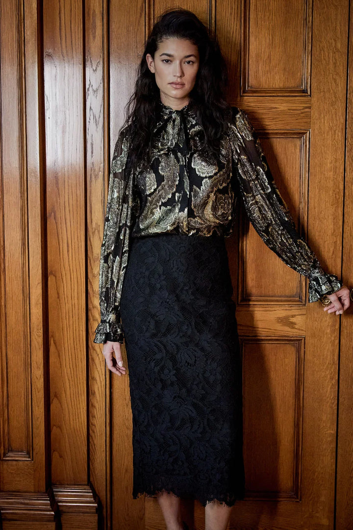 Niosha Lurex Jacquard blouse with high ruffled neckline, puffed sleeves, and removable scarf, front view on white.