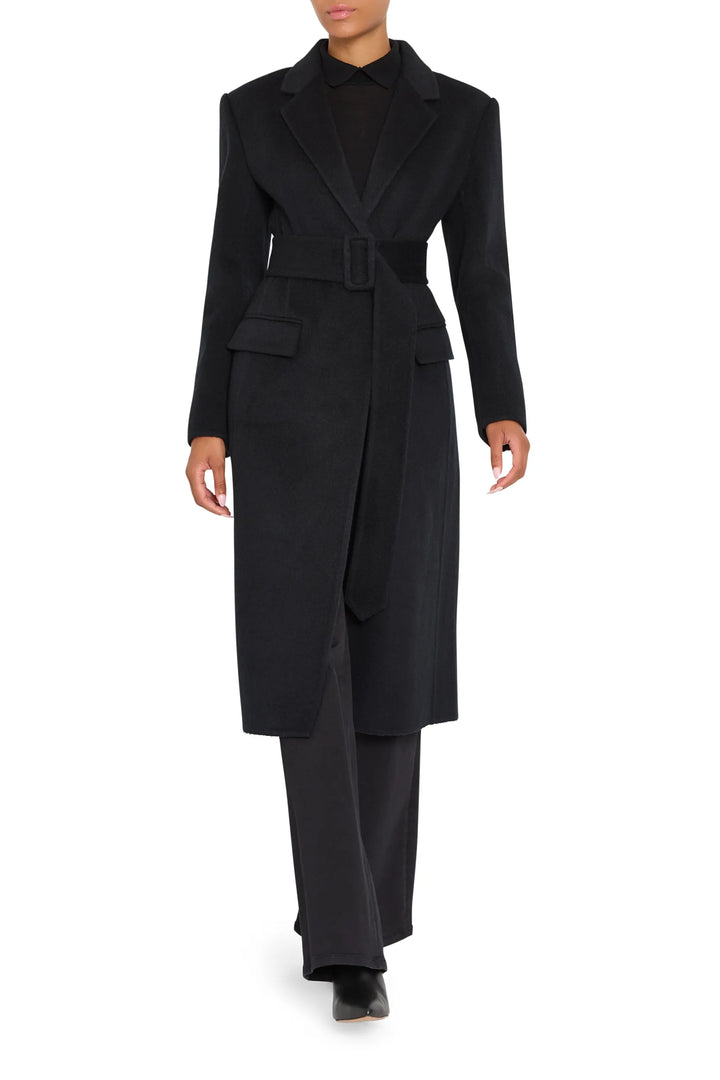 Sophisticated belted coat in wool-silk, tailored silhouette with clean lines and defined waist; front view on model.