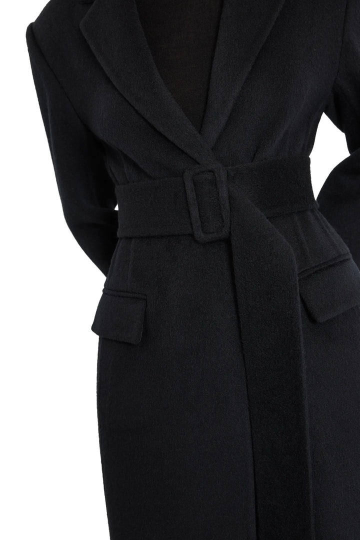 Detail of Sophie Wool Silk Belted Coat, showing flap pocket construction and fabric texture; detail view.