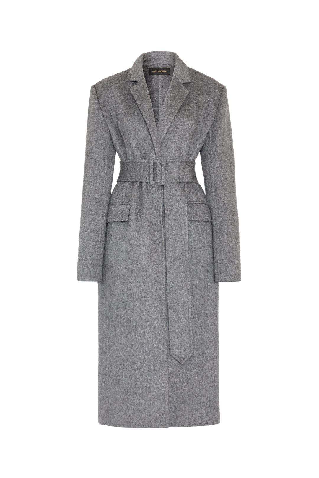 Long hourglass coat with lapel collar, self belt, double-faced wool, two front pockets; front view on white.