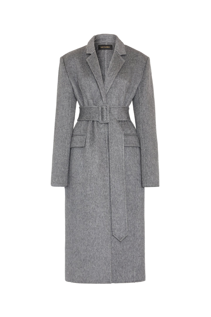 Long hourglass coat with lapel collar, self belt, double-faced wool, two front pockets; front view on white.