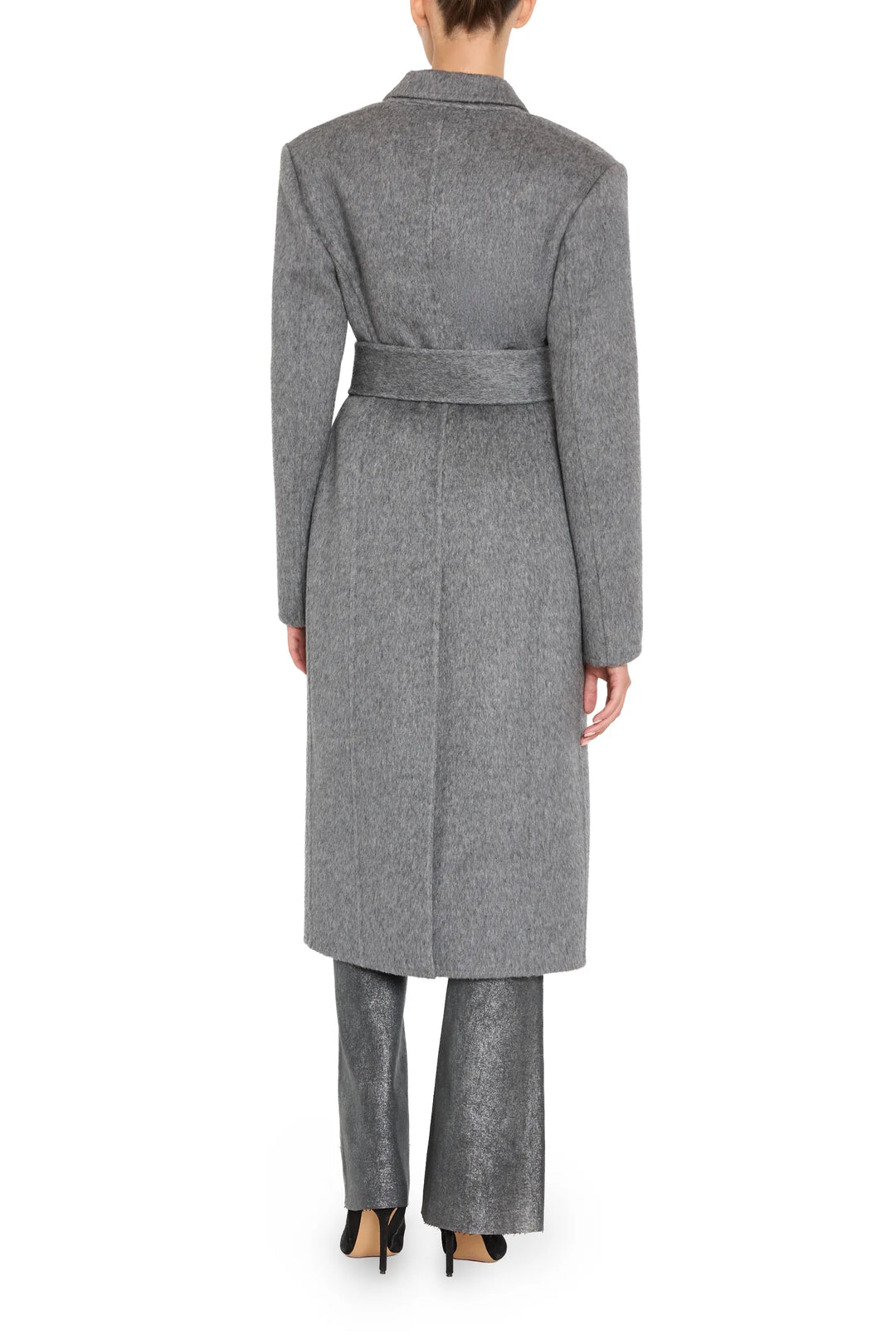 Long belted coat in wool silk with couture tailoring, draped silhouette and clean lines, back view on model.