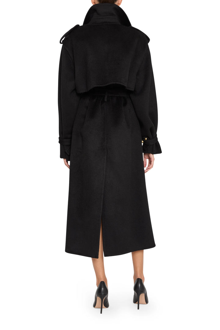 Long, belted trench coat in silk wool with structured collar and back storm flap; back view on model.