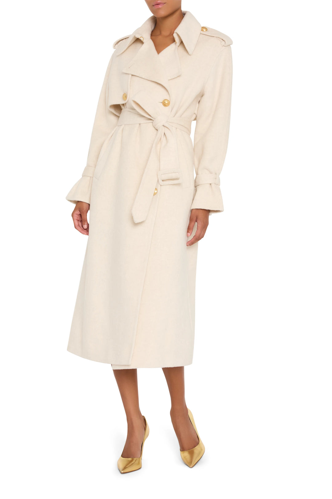 Silk wool trench coat with tailored silhouette, gold buttons, structured collar; front view on model.