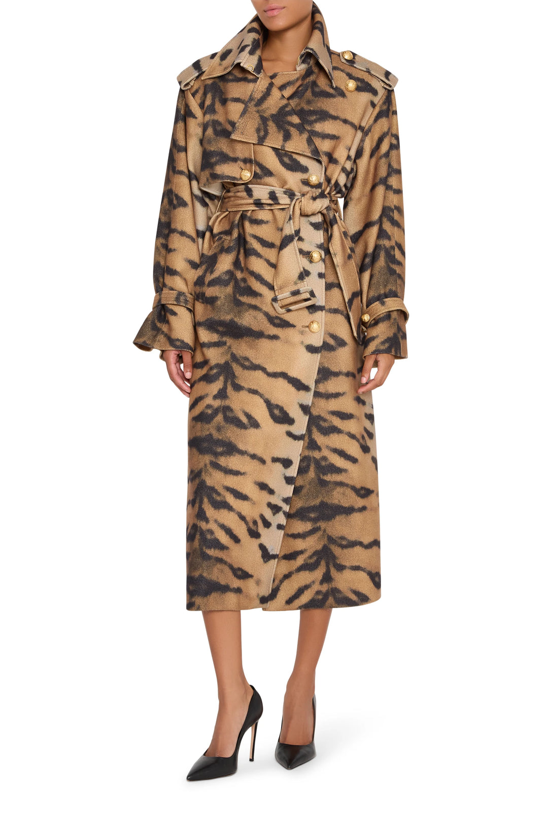 Long tiger print coat with belted waist, tailored silhouette. Front view on model.