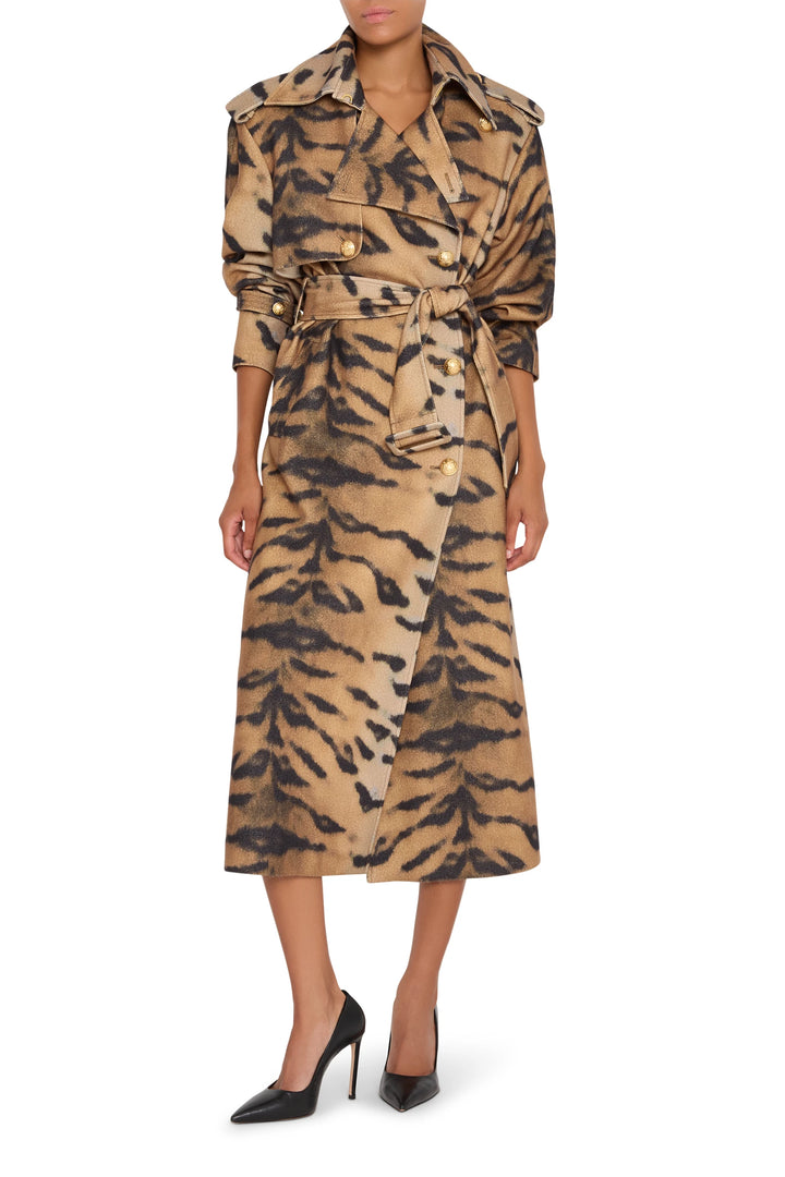 Animal printed coat with belted waist, straight silhouette, structured collar, full-length sleeves; front view on model.