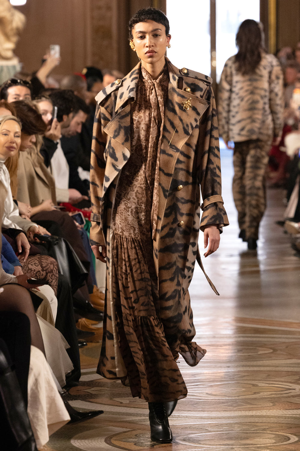 Animal Printed Coat with relaxed silhouette, full length, classic collar and button closure; front view on model.