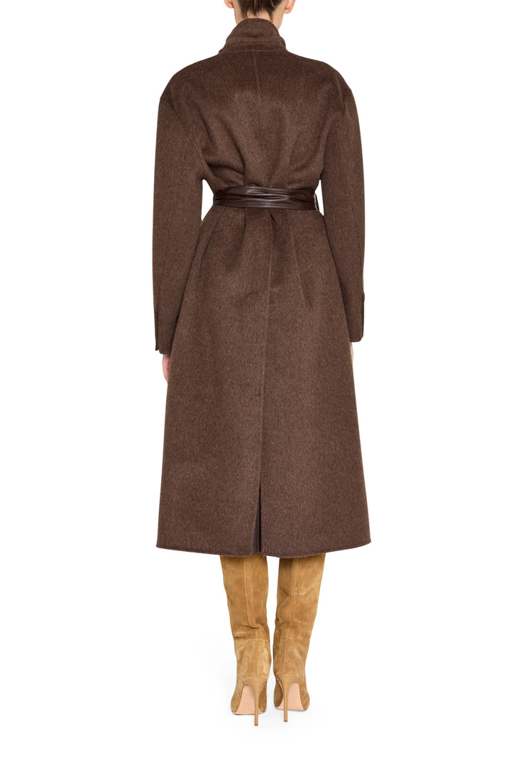 Wool coat with long, straight silhouette and clean lines, subtle lapels; back view on model.