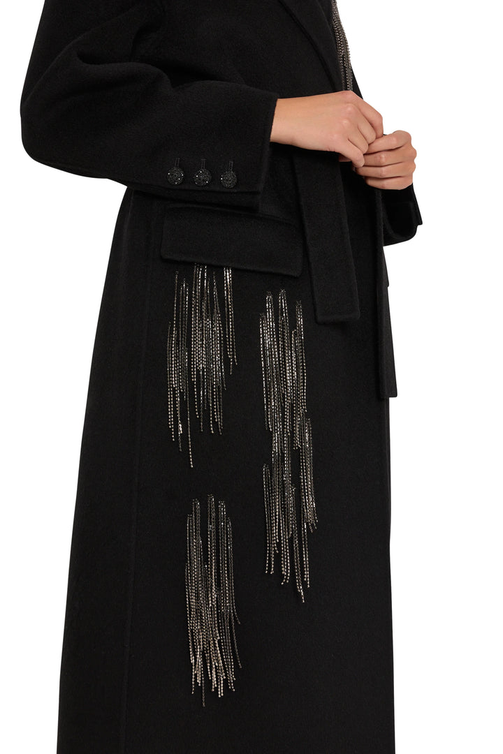 Longline wool-blend coat with metallic fringe embellishments, straight silhouette; front view on model.
