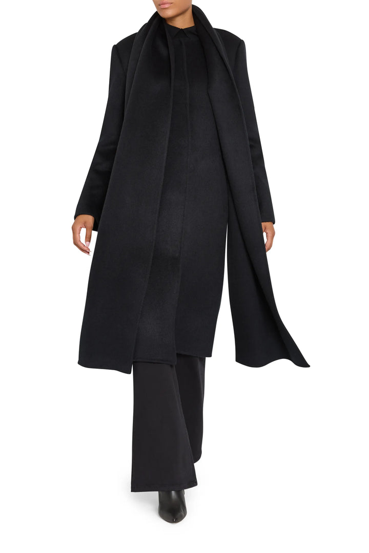 Longline Olivia Wool Coat with detachable scarf, structured shoulders, welt pockets; front view on model.