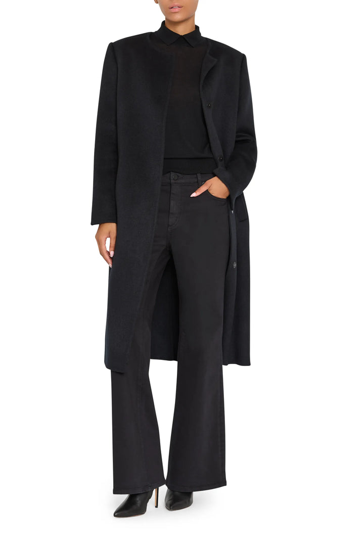 Tailored wool coat with detachable scarf, structured silhouette, clean lines, front view on white.