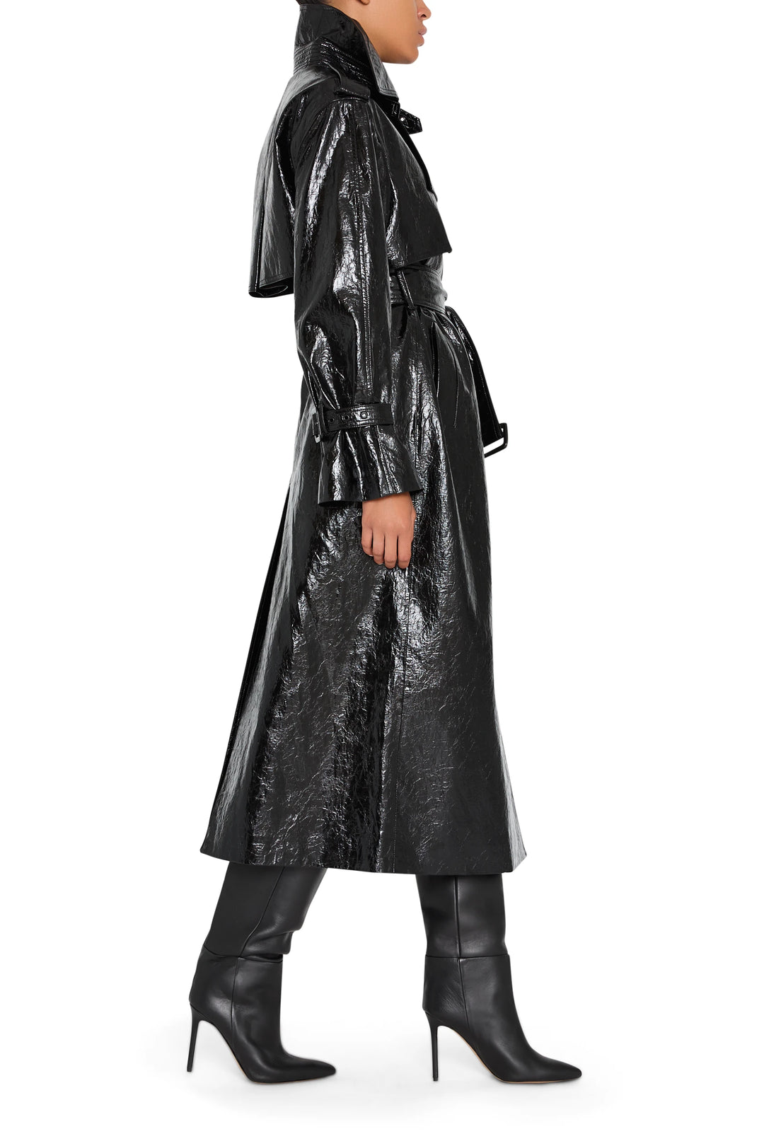 Rose vegan leather coat with clean tailoring and structured silhouette, button front, side view on model.