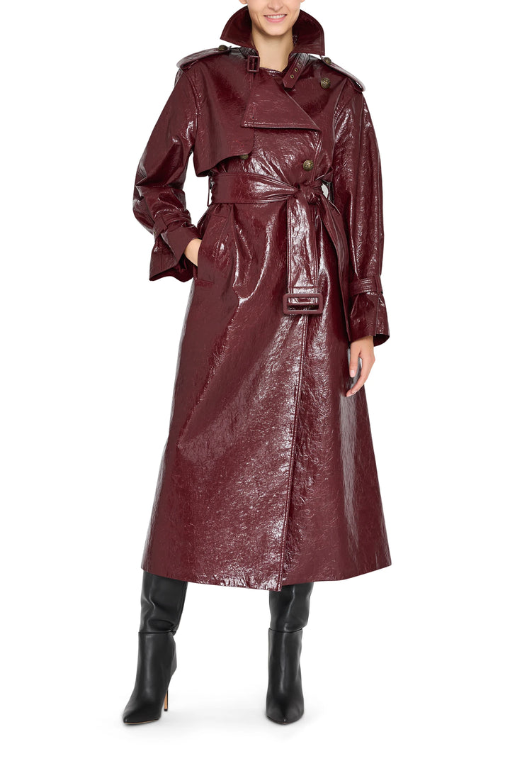 Longline, structured vegan leather coat with notch lapels and hidden closure. Front view on white.