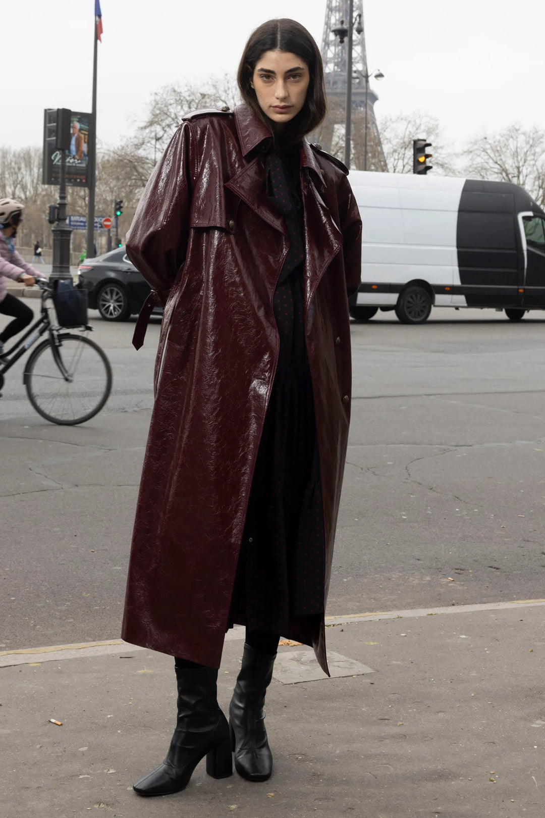 Rose vegan leather coat with structured silhouette and tailored seams, front view on model.