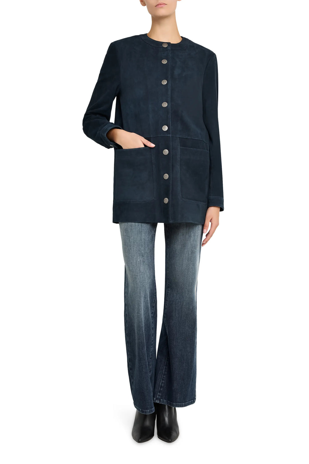 Longline suede coat with structured shoulders, minimalist design, clean lines; front view on white.