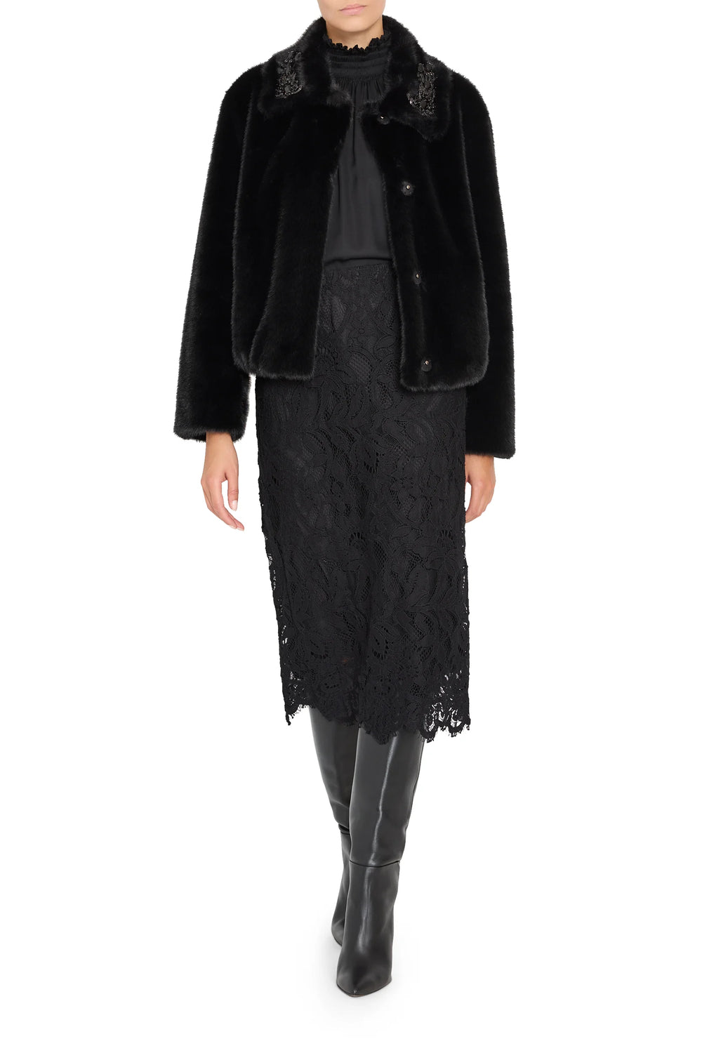 Faux fur short coat with jeweled embellishments, structured silhouette. Front view on white.