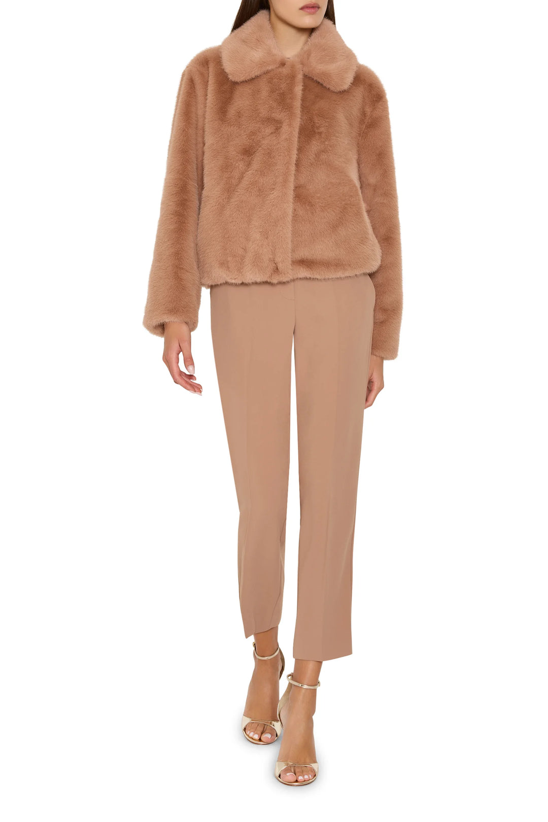 Short coat in faux fur with jeweled embellishments, structured silhouette; front view on white.