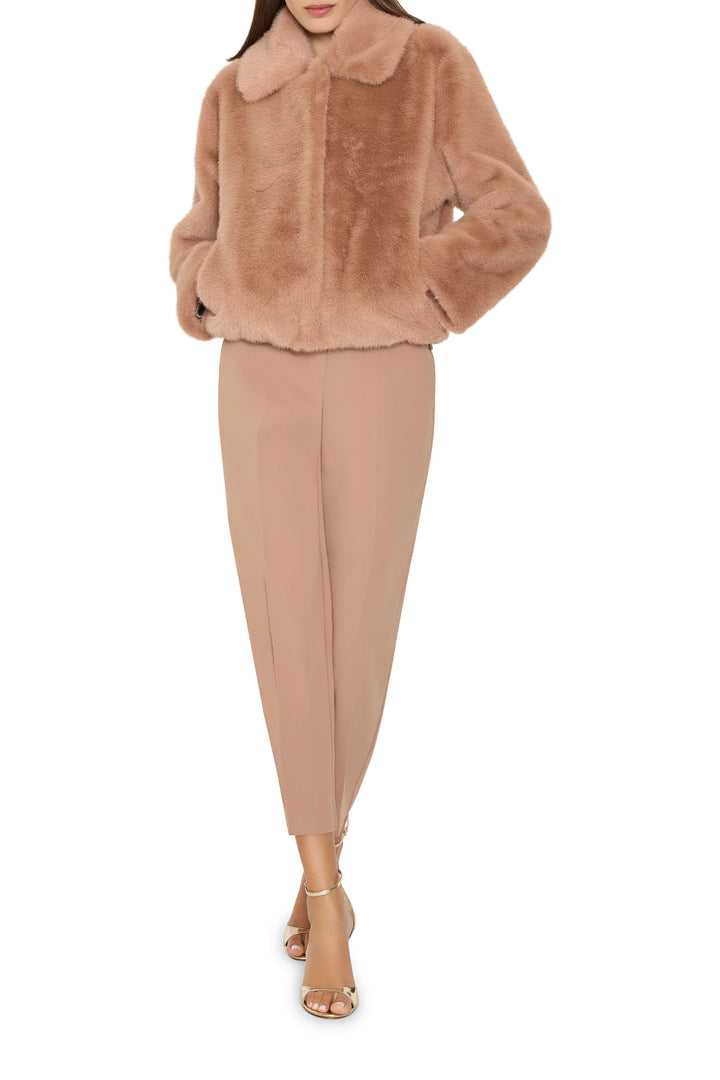 Short faux fur coat with jeweled embellishments, straight silhouette; front view on white.