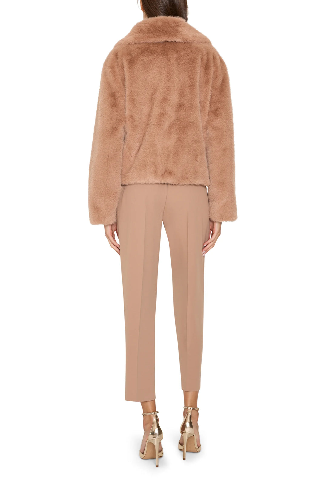 Short faux fur coat with jeweled embellishments, straight silhouette; back view on model.