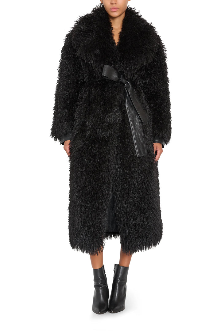 Faux Mongolian coat with wide collar, belted waist, textured faux fur finish; front view on model.