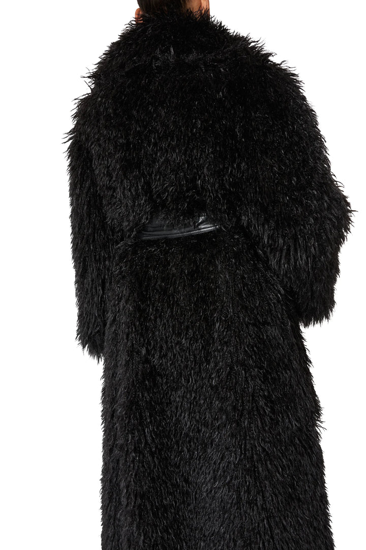 Long belted coat, relaxed silhouette, faux Mongolian fabric, flowing construction; back view on model.