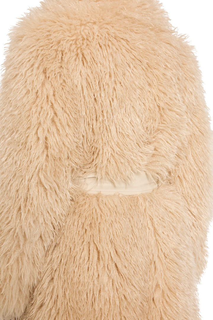 Detail of faux Mongolian fur texture and vegan leather belt construction. Detail view.