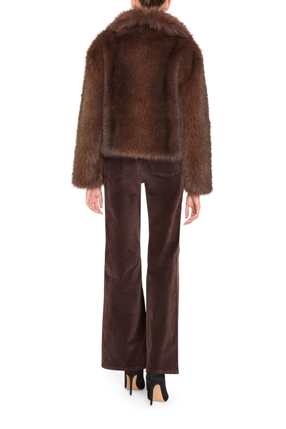 Boxy faux fur jacket with cropped hem and collar, visible seaming; back view on model.