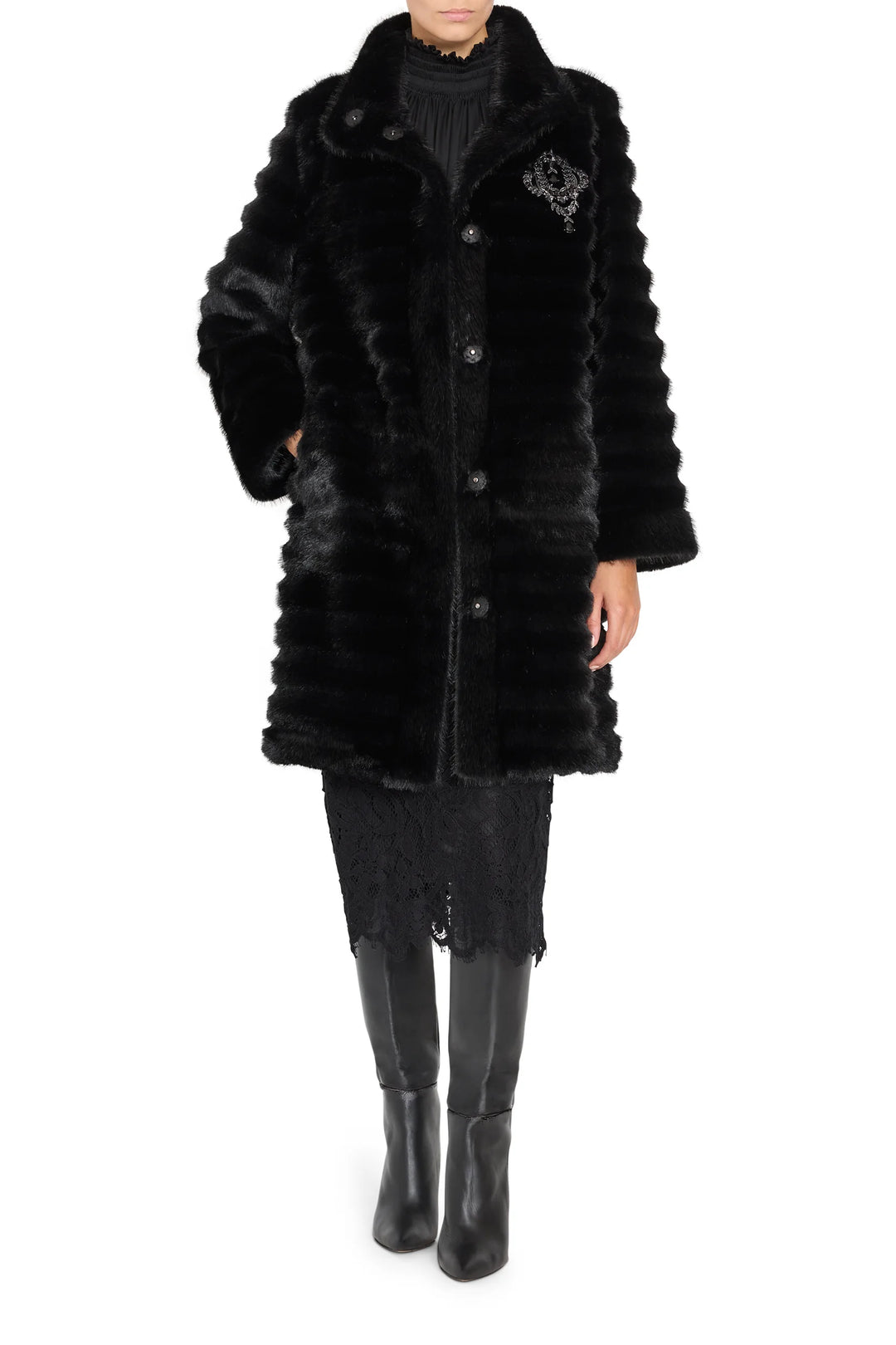 Long faux fur coat with jeweled embellishments, tailored silhouette, plush texture; front view on white.