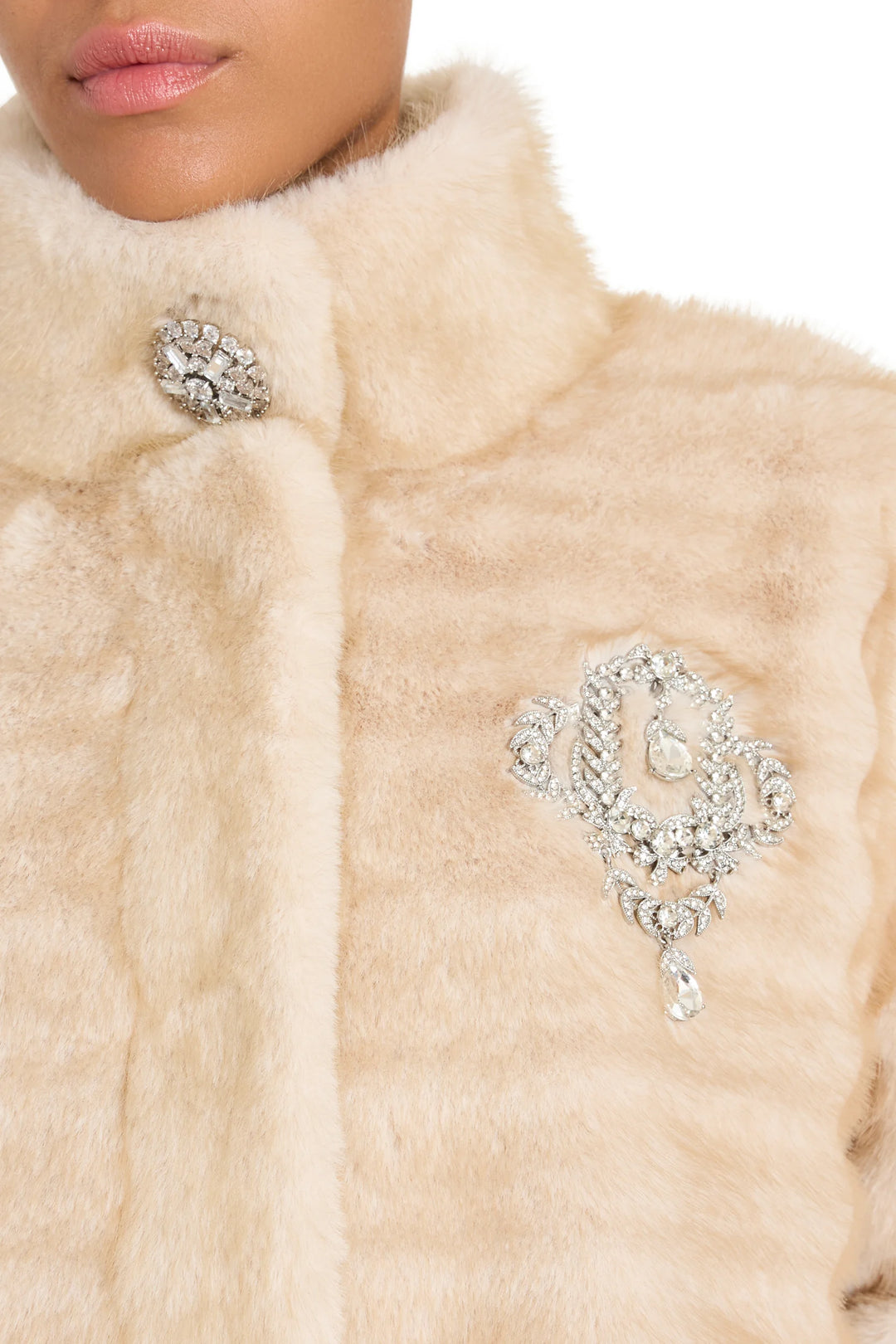 Striped, vintage-inspired faux fur coat with jeweled embellishment, tailored silhouette; front view on model.