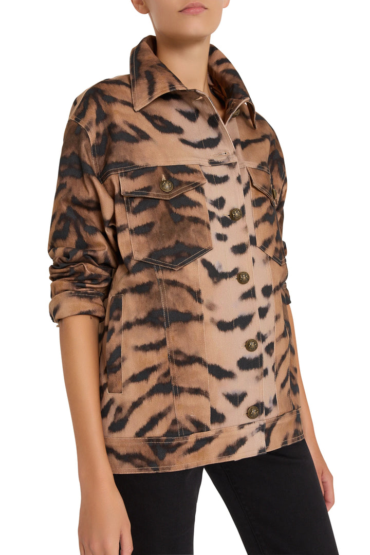 Tiger print jacket with large buttons, front patch pockets, structured silhouette; front view on model.