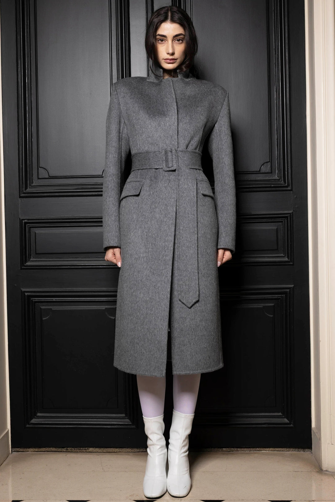 Long belted coat with a tailored silhouette in wool silk blend, notched lapel, front view on model.