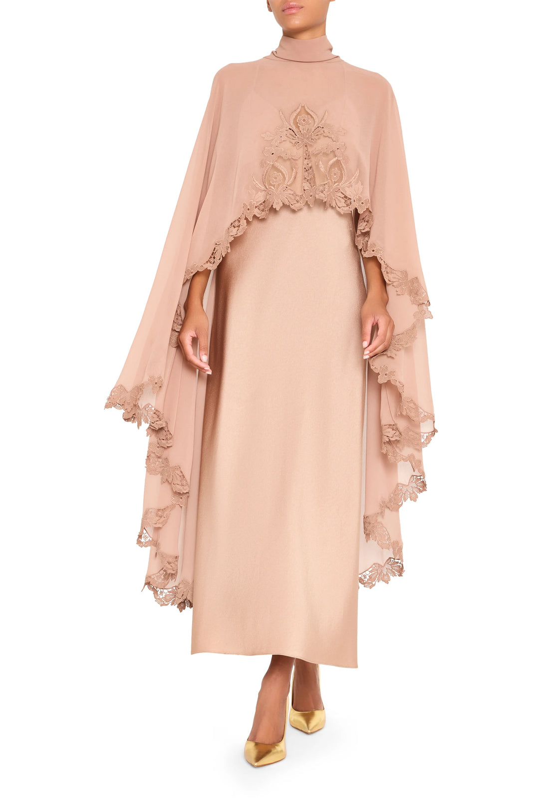 Beige Carmen long dress with attached cape, lace trim accents, fluid silhouette, front view on white.