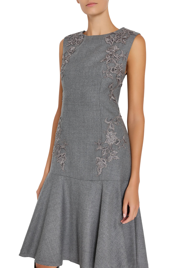 Fit-and-flare midi dress with embroidered flannel, button front placket, and softly gathered skirt. Front view on white.