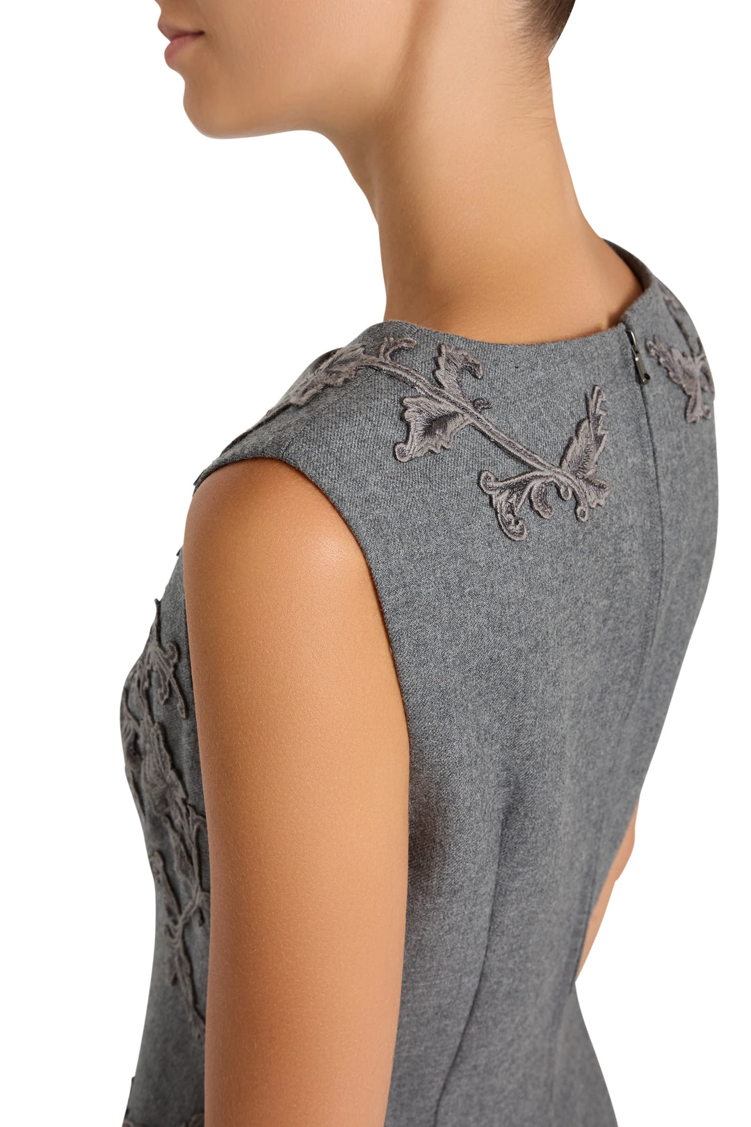 Sleeveless fit-and-flare dress with embroidered flannel, tailored waist, scoop back. Back view on model.