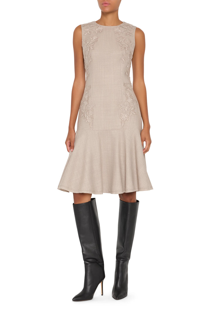 Midi flannel dress with floral embroidery, fitted bodice, button front, full skirt; front view on model.