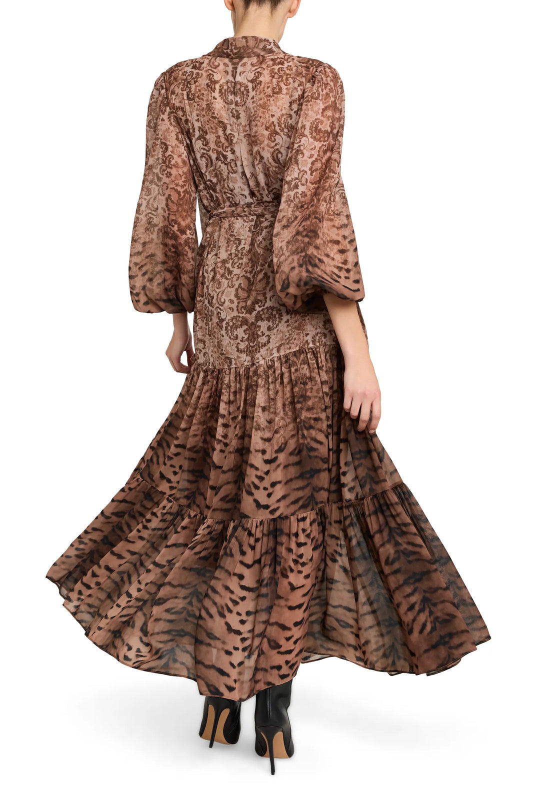 Maxi silhouette dress with flared sleeves, back view on model.
