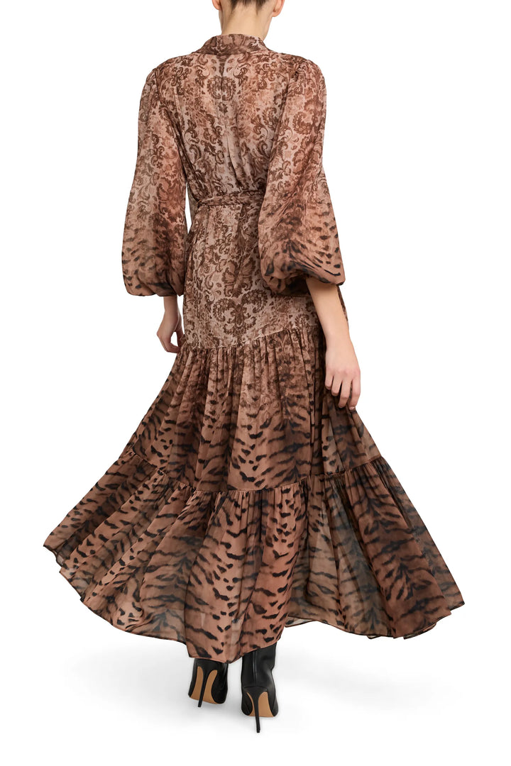 Maxi silhouette dress with flared sleeves, back view on model.